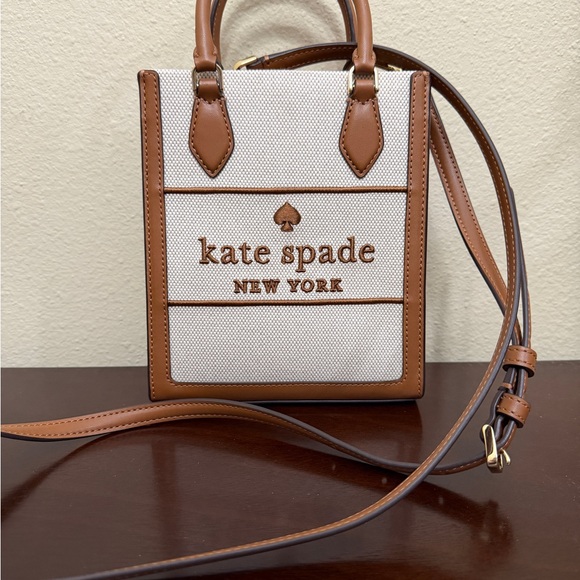 kate spade Handbags - NWOT kate spade Ellie Tan and Brown Canvas Mini Tote Crossbody